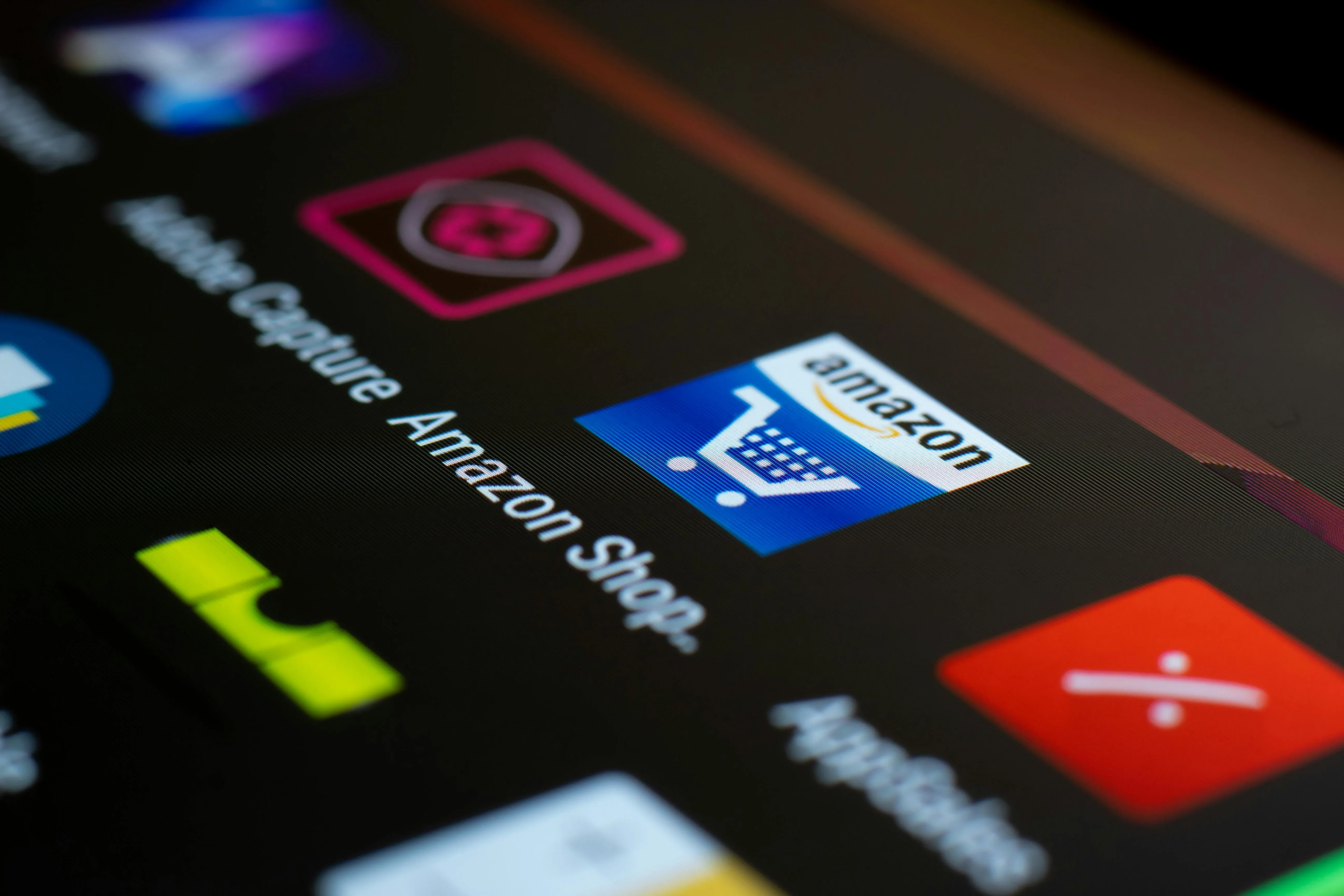 Picture of a smartphone screen displaying the Amazon Shop app icon
